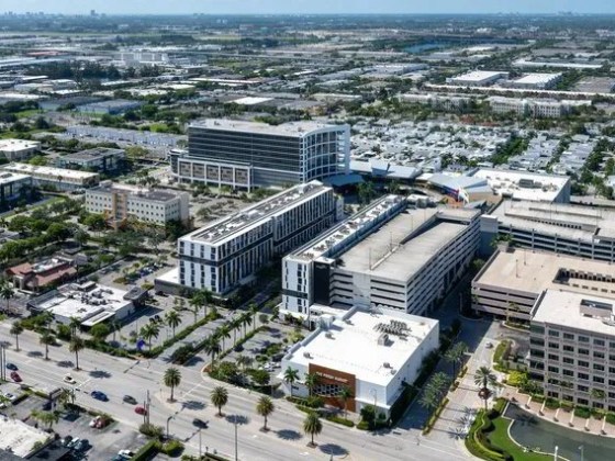 Aerial view of a suburban area with office buildings and roads.